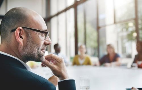 Business professional considering a decision